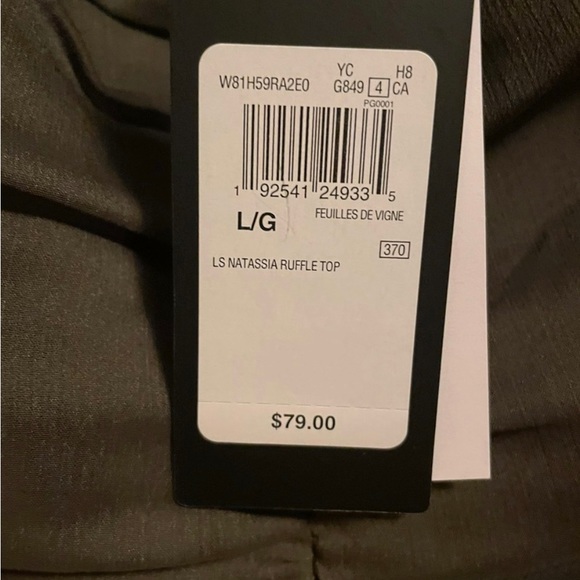 Guess green ruffle top, size large. Fits more like a medium. - Picture 4 of 5